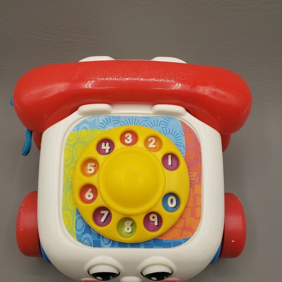 FisherPrice Toys Vintage Fisher Price Chatter Phone 200 Telephone Pull Toy W Moving Eyes